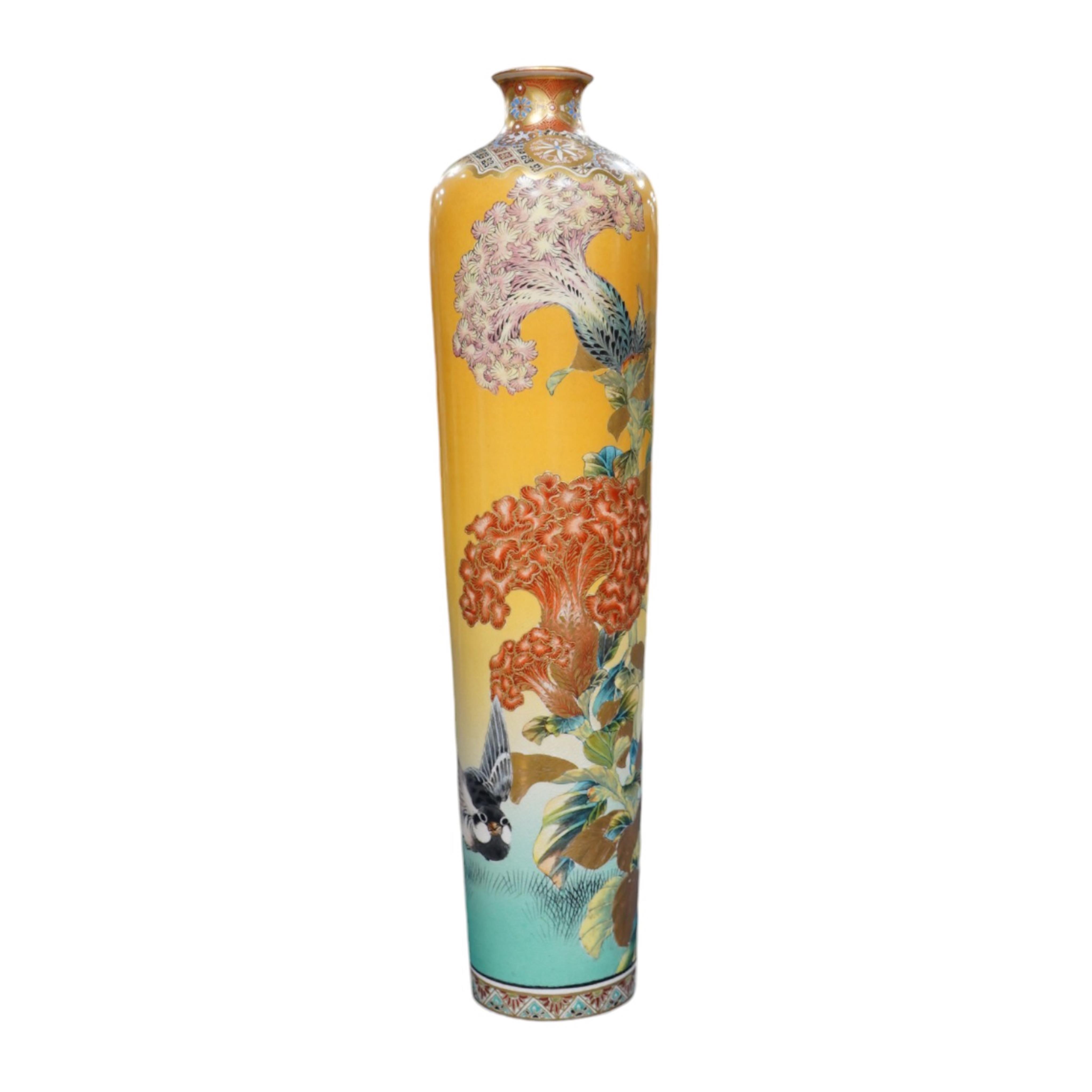 A Japanese Satsuma tall vase, Meiji period, by Taizan Yohei III, decorated with birds and blossom on a yellow ground, signed, 37cm high. Condition - hairline crack, otherwise good condition